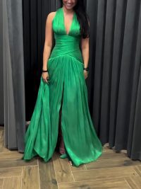 Emerald Green Plunging Neckline Gown With Pleated Skirt And Side Slit