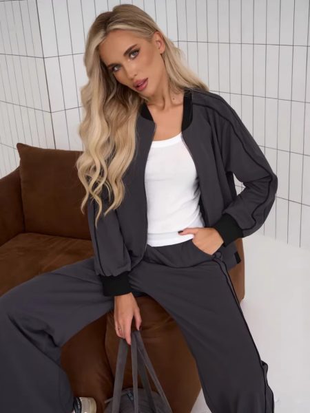 Two Piece Set Featuring A Color Blocked Cardigan With Zippers And Matching Pants