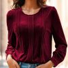 A Solid-colored Long-sleeved Top For Ladies